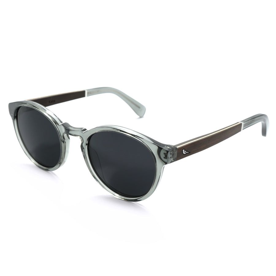 Corner view of clear grey frame sunglasses with polarised lenses