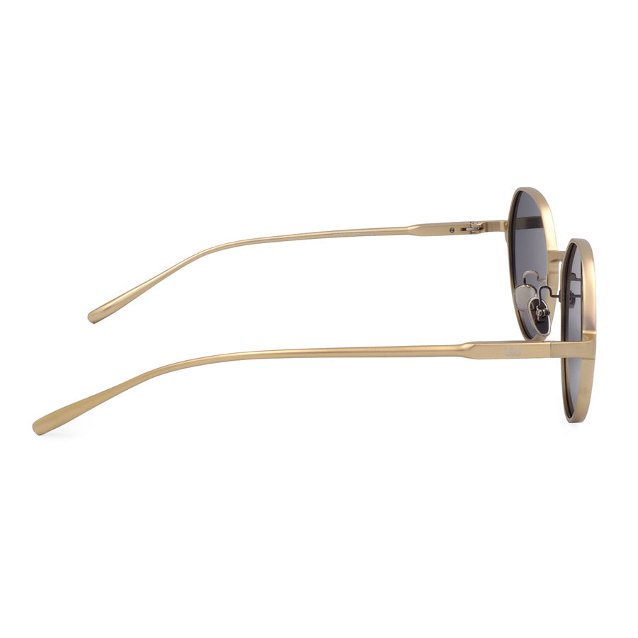 Side view of round sunglasses with gold frame and grey lenses